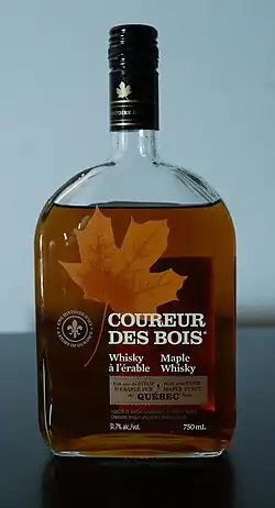 A mostly full bottle of Coureur des bois maple whisky