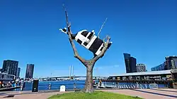 "Cow up a tree" by John Kelly
