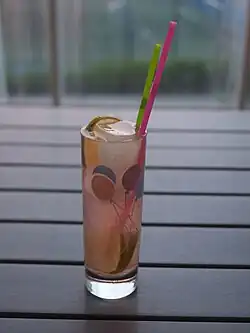 Gin and tonic made from Estonian Crafter's Gin. The botanicals in the gin have turned the drink pink in colour.