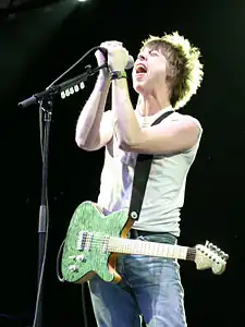 Nicholls performing in December 2003
