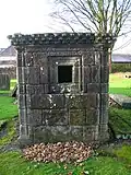 The viewing window in the 1594 tomb of Captain Thomas Crawfurd of Jordanhill.