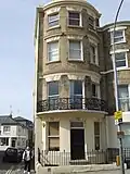 Cream coloured mathematical tiles on an Amon Wilds house on St George's Place Location on Google Maps