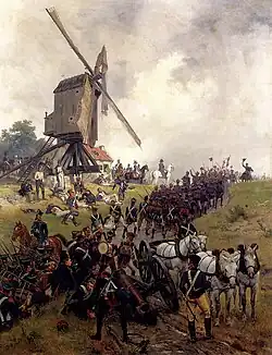Ligny. The advancing French pass Napoleon. Painted by Ernest Crofts (1875). This representation shows Napoleon surrounded by his staff surveying the battlefield while columns of infantry advance to the front. The windmill is probably that on the heights of Naveau, which served as Napoleon's command post during the battle.[42]
