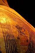 Goddess design on ceramic pot