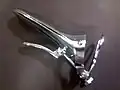 Cusco's self retaining bivalve vaginal speculum (closed) seen from the left. It is very much used in taking smears from the vagina for Papanicolaou test and routine examinations.