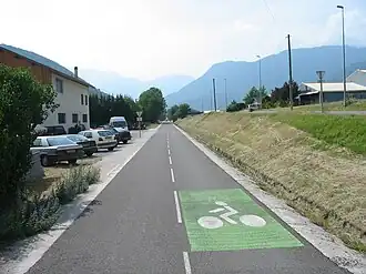 Paved bicycle path designed exclusively for cyclists, clearly marked and separated from motor vehicle traffic, illustrating a typical bike path environment.