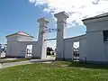 Entrance to the Cypress Grove Cemetery, with gates said to be suggestive of triumphal passage from one world to the next[12]