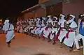 A group of Gnawas dance to a song.