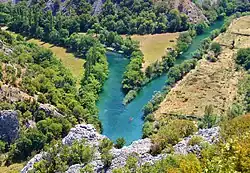 Krupa flows into Zrmanja from the left side on the photo.
