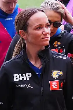 Pearce walking towards the coaches box before a football match