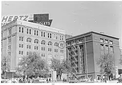 The Dal-Tex Building (right), across the street from the Texas School Book Depository Building