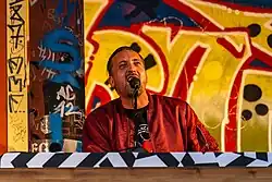 Danger Dan sings at a live concert in the Rote Flora in Hamburg