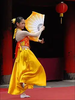 A female dancer wearing yếm