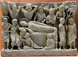 Room 33 – Stone sculpture of the death of Buddha, Gandhara, Pakistan, 1st–3rd centuries AD