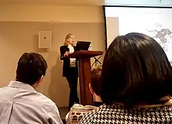 Rhode giving a presentation in 2011