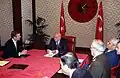 The Turkish flag and the Presidential Standard behind the 9th President Süleyman Demirel.