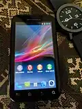 Motorola Defy running Xperia D, a custom CyanogenMod ROM based on Android 4.2 (Jelly Bean)