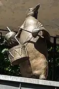 Insert shot of the penguin on the Delacorte Clock