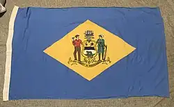 Vintage state flag with a golden rhombus and no text.