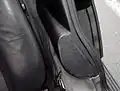 Later-style one-piece armrest extension found on a DeLorean
