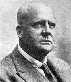 Black and white photographic portrait of Deneys Reitz in three quarter profile