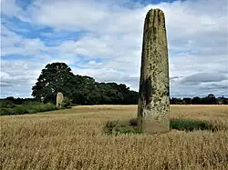 A line of three large standing stones