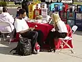 Streetside Scientology stress tests selling Dianetics books (2007)