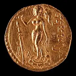 The queen, reverse of last, is holding a chowrie for the fanning of the horse and a needle-like pointed instrument, with legend "One powerful enough to perform the Ashvamedha sacrifice".[107][108]