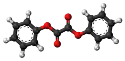 Ball-and-stick model of the diphenyl oxalate molecule