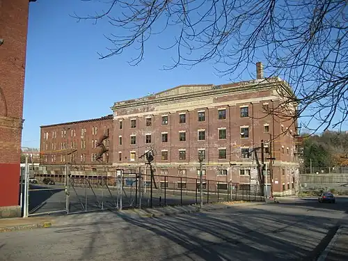 Former Oliver Ditson Company building, 166 Terrace Street, in the Mission Hill neighborhood of Roxbury, Massachusetts, later gutted and re-built as luxury apartments.[5] Building inscription reads "Oliver Ditson Co. 1835-1925".[6][7]