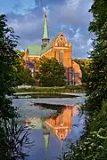 Northwest view of the minster with reflection in the pond