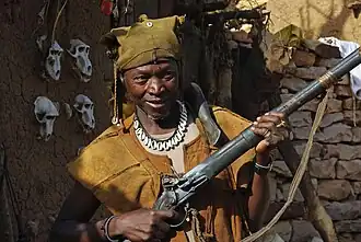 Image 13A Dogon hunter with an old flintlock rifle still in use. (from Culture of Mali)