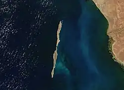 thin, vertically stretched island, with continental shore appearing on the right