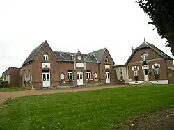 The town hall and school in Douilly
