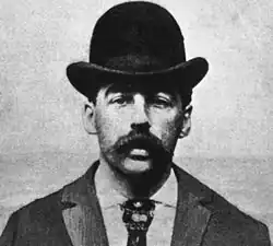 Second mugshot photograph of Holmes