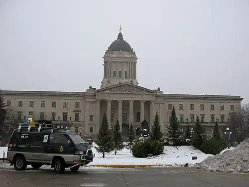 The Driven to Sustain van parked in front of the Manitoba Legislative Building during its sustainability tour.
