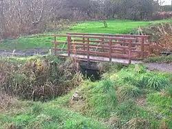 The site of the Drukken Steps over the Red Burn on the 1774 Toll road to Millburn via Higgens House.[6]