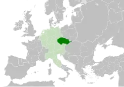 The Czech state in form of Duchy of Bohemia (green) in 11th century, within the Holy Roman Empire (light green).