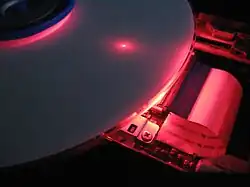 Dvd burner operating with the cover removed