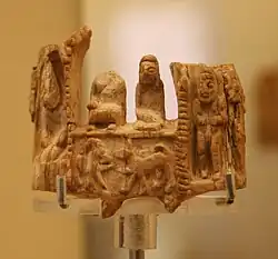 Naqada IId carving, with dynastic rulers and animals, and kneeling soldiers on the reverse.[52][53]