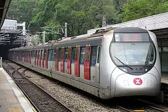 Refurbished SP1900 train E217 on the East Rail line at Kowloon Tong station