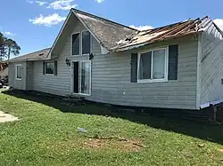 Image 70EF2 damage to a home that was shifted off its foundation and sustained partial roof loss southwest of Douglas, Georgia. (from Tornadoes of 2021)