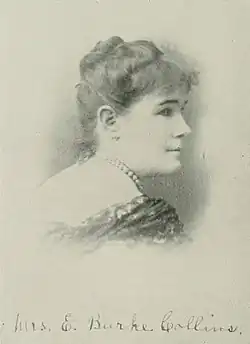 B&W portrait photo of a middle-aged woman with her hair in an up-do.