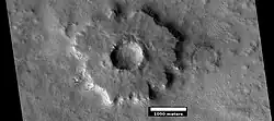 Pedestal crater, as seen by HiRISE under HiWish program. Top layer has protected the lower material from being eroded.