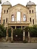 Facade of the ruined Synagogue before restoration