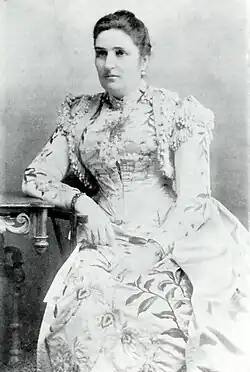 Blake, around 54, sits and poses for a photograph.