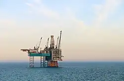 Photo of an oil rig at sea