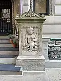 Carved stone pier at the main entry