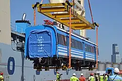 Roca Line cars being unloaded at the Port of Buenos Aires