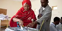Image 21In 2021, a woman casts her vote in the House of Representatives election. (from History of Somaliland)